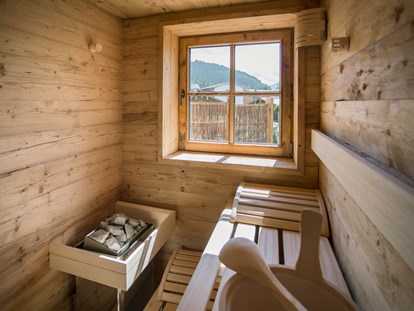 Hüttendorf - Pools: Außenpool - Jedes Chalet hat eine eigene Sauna - Alpin Chalets Panoramahotel Oberjoch