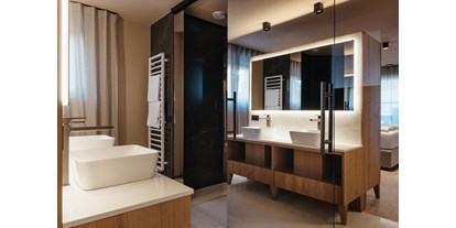 Hüttendorf - Schwerpunkt: Skiurlaub - Badezimmer 1 -  Pescosta Chalet Luxury Living