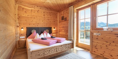 Hüttendorf - Schwerpunkt: Winterurlaub - Tirol - 2 Schlafzimmer - jeweils mit eigenem Badezimmer. - Ferienhütten Tirol