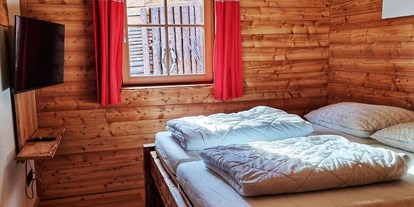 Hüttendorf - Sauna: im Chalet - Turrach - Schlafzimmer Erdgeschoss Groaße Hittn  - Almhütten Sprachmann Flattnitz