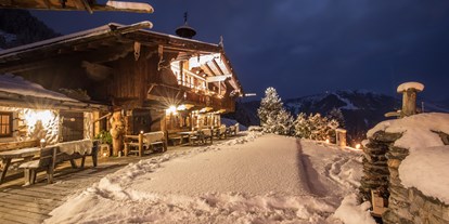 Hüttendorf - SAT TV - Steinach am Brenner - Winterfoto - Luxuschalet Bischofer-Bergwelt