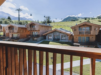Hüttendorf - WLAN - Reith bei Kitzbühel - Außenansicht unsere Chalets - Bergdorf Hotel Zaglgut Ski In & Ski Out
