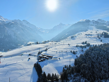 Hüttendorf - WLAN - Going am Wilden Kaiser - Logenlage mit Ski In & Ski Out - Bergdorf Hotel Zaglgut Ski In & Ski Out