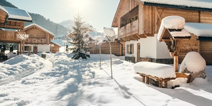 Hüttendorf - Terrasse - Mühlbach - Spinges - Unsere Chalets im Winter - Pradel Dolomites