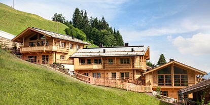 Hüttendorf - Küche - HochLeger Luxury Chalet Resort