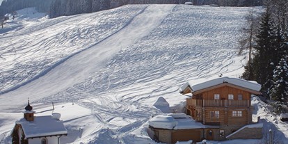 Hüttendorf - Schwerpunkt: Skiurlaub - Unser Schmankerl Chalet für 8 Personen, direkt an der Piste - Hüttendorf Maria Alm