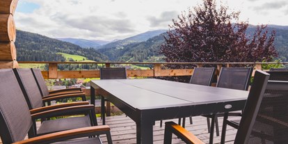 Hüttendorf - Schwerpunkt: Familienurlaub - Steiermark - Sitzplatz mit Aussicht - Kreischberg Lodge