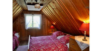 Hüttendorf - Schwerpunkt: Urlaub mit Hund - 2. Schlafzimmer - Romantische Ferienhütte