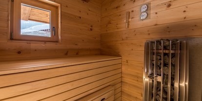Hüttendorf - Schwerpunkt: Familienurlaub - Dienten am Hochkönig - Chalet Herbstzeit Leogang Sauna (im Badezimmer integriert) - Herbstzeit Chalet Leogang