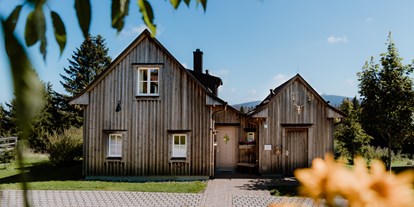 Hüttendorf - Fahrradgarage: im Chalet - Niedersachsen - Exklusive Lodge mit 3 Schlafräumen, Kamin und Sauna. Freistehendes Haus. - Torfhaus HARZRESORT