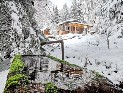 Hüttendorf - Doppelbett - Chalet HERZblatt im Winter - Traumhütten für Zwoa