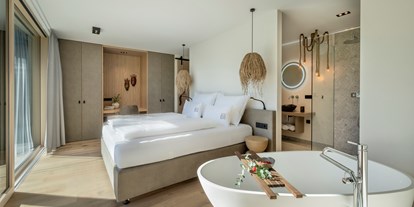Hüttendorf - Sonnenterrasse - Ein Schlafzimmer zum Verlieben - Julianhof - Premium Guesthouse & Spa