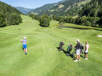 Hüttendorf - Schwerpunkt: Familienurlaub - Golfen mit Bergpanorama - Trattlers Hof-Chalets