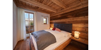 Hüttendorf - Schwerpunkt: Winterurlaub - Zwei Schlafzimmer im 1 OG mit Dusche und WC - Almidylle 