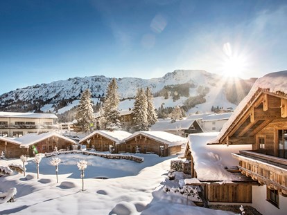 Hüttendorf - Rauchen: nur im Freien erlaubt - Tiroler Oberland - Winterliches Chaletsdorf - Alpin Chalets Panoramahotel Oberjoch
