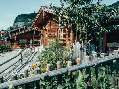 Hüttendorf - Typ: Lodge - Deutschland - Außenansicht Chalets - Alpzitt Chalets