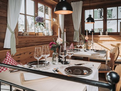 Hüttendorf - Typ: Lodge - Deutschland - Fine Dining in unserem Restaurant Genusswerk - Alpzitt Chalets