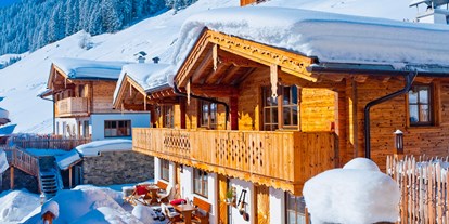 Hüttendorf - Ski-In/Ski-Out: Ski-In - Österreich - Bezaubernde Wintertage - Alpendorf Anno Dazumal