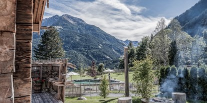 Hüttendorf - Ladestation für E-Autos: beim Hauptparkplatz - Tirol - Benglerwald Berg Chaletdorf - Benglerwald Berg Chaletdorf