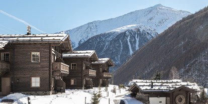 Hüttendorf - Sonnenterrasse - Südtirol - Hotel & Chalets Edelweiss im Winter  - Hotel & Chalets Edelweiss