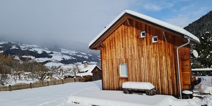 Hüttendorf - Balkon - Steiermark - Chalet Paal 162 - Winter 2023 - Almdorf Stadl by ALPS RESORTS