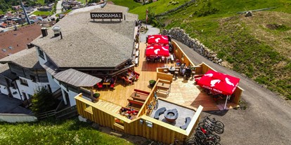 Hüttendorf - Skiraum: im Chalet - Tiroler Oberland - Chalets & Aparthotel Grünwald Resort Sölden mit Pool an der Piste