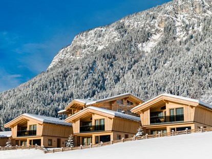 Hüttendorf - Umgebungsschwerpunkt: am Land - Tirol - Winteransicht Aussen - Beim Hochfilzer-Hotel & Premium Chalets ****s