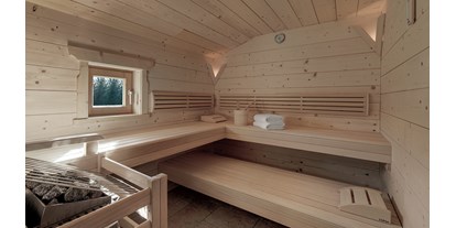 Hüttendorf - Schwerpunkt: Romantikurlaub - INNs HOLZ Chalet Sauna des Private Spas im Chalet - INNs HOLZ Chaletdorf