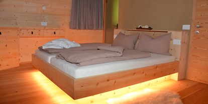 Hüttendorf - Gartengrill - Trentino-Südtirol - Schlafzimmer - Natur Chalet 