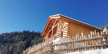 Hüttendorf - Kachelofen - Südtirol - Natur Chalet 