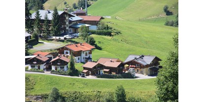 Hüttendorf - zustellbares Kinderbett - Pinzgau - Sommer - Feriendorf Stallergut