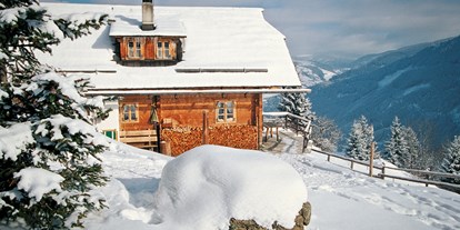 Hüttendorf - Typ: Almchalet - Österreich - Almdorf im Winter - Almdorf Seinerzeit