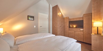 Hüttendorf - Typ: Luxuschalet - Deutschland - Schlafzimmer im Obergeschoß - Das Schierke Harzresort