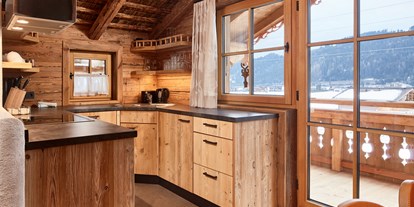 Hüttendorf - Typ: Skihütte - voll ausgestattete Küche - Promi Alm Flachau