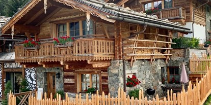 Hüttendorf - Typ: Blockhütte - Österreich - Jedes Chalet mit Balkon und Terrasse - Promi Alm Flachau