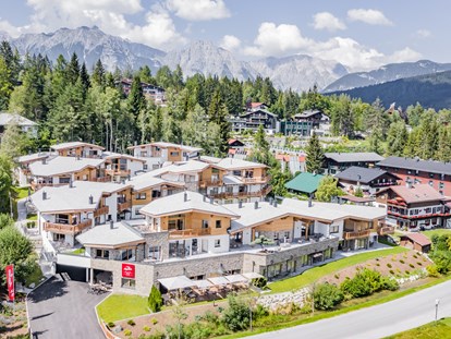 Hüttendorf - Ladestation für E-Autos: beim Hauptparkplatz - Tirol - AlpenParks Chalet & Apartment Alpina Seefeld