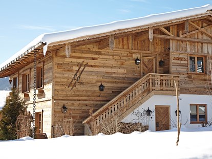 Hüttendorf - Schwerpunkt: Skiurlaub - Außenansicht Chalet im Winter - Chalet F