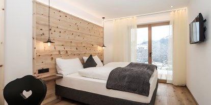 Hüttendorf - Trentino-Südtirol - Schlafzimmer - Hauserhof Chalet