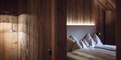 Hüttendorf - Einzelbett - Trentino-Südtirol - Bauernschlafzimmer  - Amus Chalets Dolomites