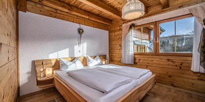 Hüttendorf - Schwerpunkt: Bikeurlaub - Ferienwohnung Stefanie Schlafzimmer 1 - Heumanns Blockhäuser am Wald