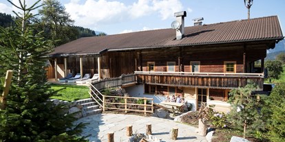 Hüttendorf - Whirlpool: beim Chalet - Tirol - Bergchalet Rauchenhof