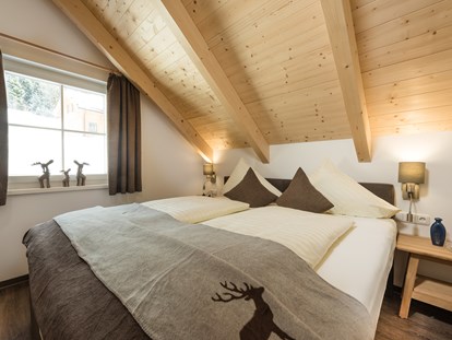 Hüttendorf - zustellbares Kinderbett - AlpenParks Hagan Lodge Altaussee