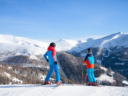 Hüttendorf - Ski-In/Ski-Out: Ski-In & Ski-Out - Österreich - Pistenspaß inmitten der Kärntner Nockberge - Trattlers Hof-Chalets