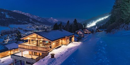Hüttendorf - Typ: Skihütte - Steiermark - Unsere Chalets mit Indoorpool direkt an der Piste und mit Blick auf Schladming. - Hüttendorf Schladming