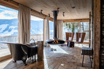 Chalet: Wohnraum in der Wilderer Villa - PRIESTEREGG Premium ECO Resort