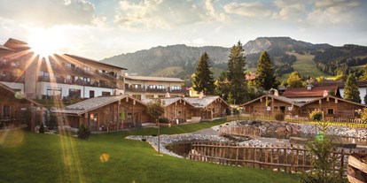 Hüttendorf - zustellbares Kinderbett - PLZ 6604 (Österreich) - Alpin Chalets Panoramahotel Oberjoch