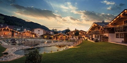 Hüttendorf - zustellbares Kinderbett - PLZ 6764 (Österreich) - Alpin Chalets Panoramahotel Oberjoch
