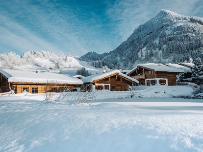 Hüttendorf - Private Spa - Chaletdorf im Winter
 - Alpzitt Chalets