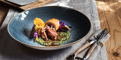 Hüttendorf - Schwerpunkt: Romantikurlaub - Bichlbach - Fine Dining in unserem Restaurant Genusswerk - Alpzitt Chalets
