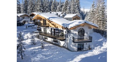 Hüttendorf - Skiraum: im Chalet - Stumm - Herzlich Willkommen auf der Sam-Alm Snow&Bike in Hochkrimml 
Winter Aussen - Sam-Alm 